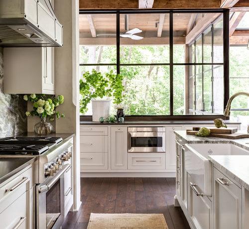 Love this beautiful modern small kitchen design with white cabinets and a vintage rug - kitchen ideas - kitchen decor - kitchen cabinet ideas - kitchen window ideas - kitchen remodel