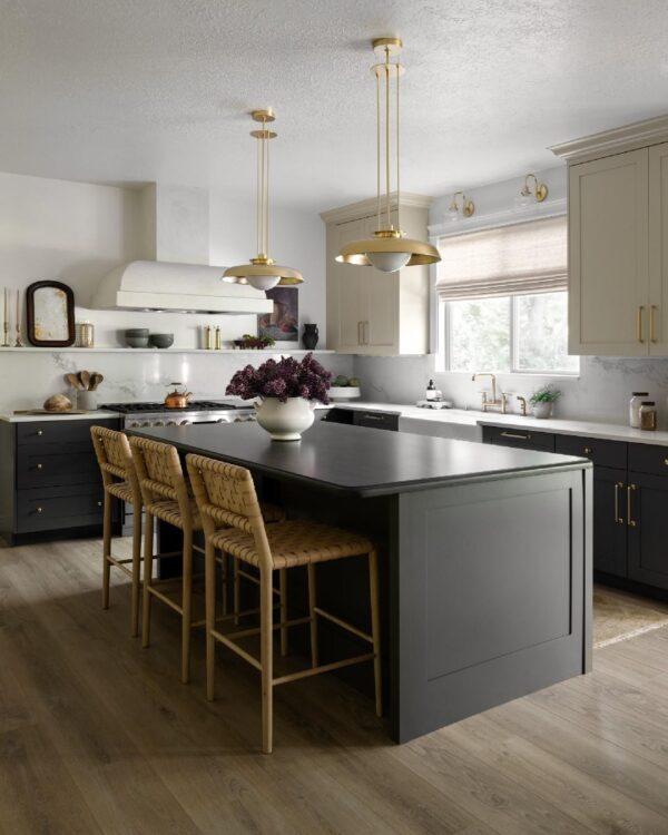 Love this beautiful modern kitchen design with dark gray island and lower cabinets, woven counter stools, and brass pendant lights - kitchen ideas - kitchen island ideas - kitchen cabinet ideas - kitchen lighting - kitchen counter stool ideas - modern farmhouse kitchens - studio mcgee dream makeover kitchen
