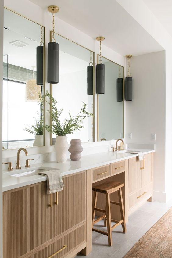 Love this beautiful modern bathroom design with a wood vanity, fluted cabinets and brass lighting and hardware - becki owens - bathroom ideas - bathroom decor - master bathroom - bathroom remodel 