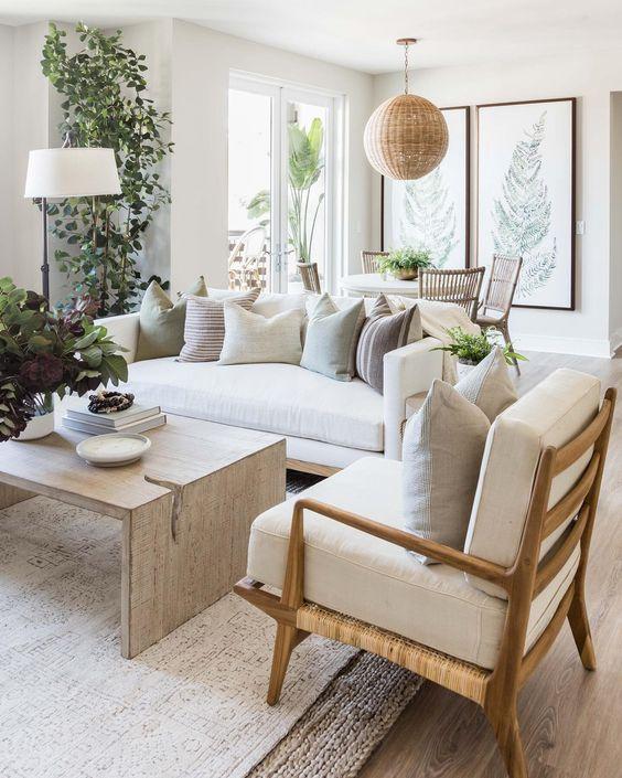 Love this beautiful modern living room with neutral furniture and decor and a wood coffee table - living room decor - living room furniture - living room table - coastal decor - coastal living room - pure salt interiors