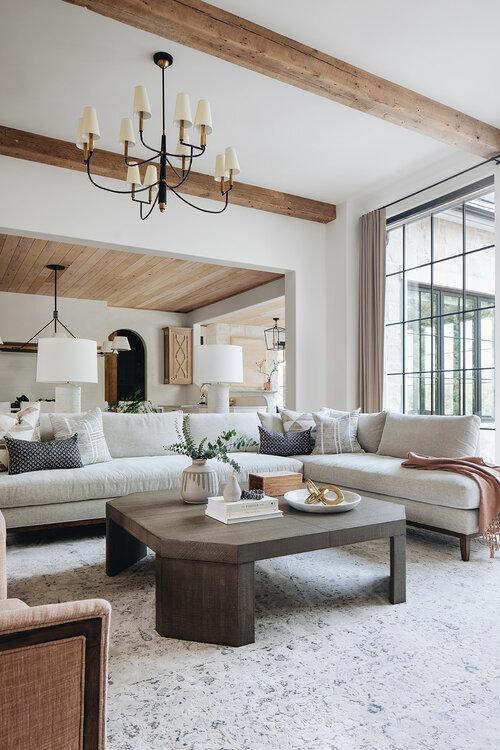 Love this beautiful timeless living room design with a large sectional, wood coffee table, and neutral furniture and decor - living room decor - transitional living room - transitional decor - home - style - kate marker interiors