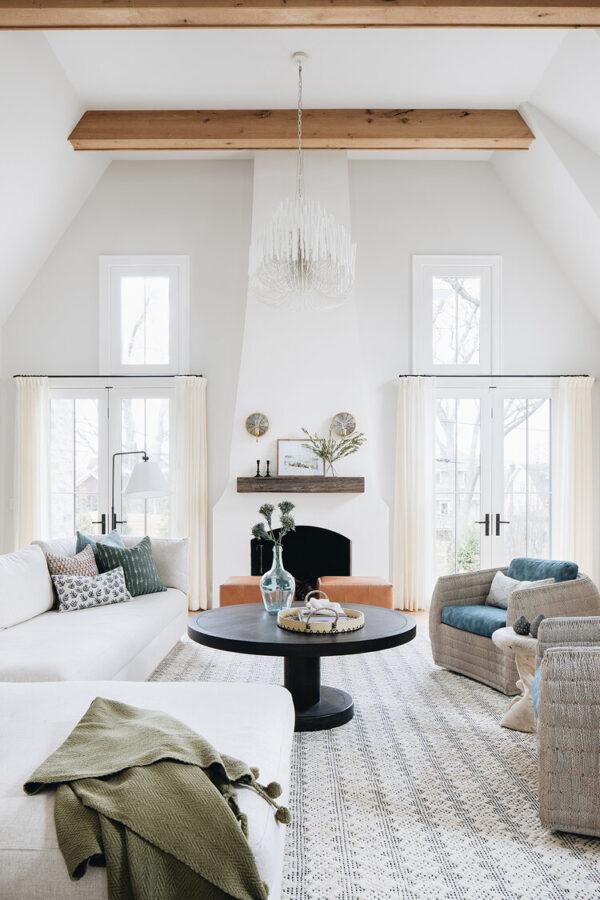 Love this light and airy modern living room design with a fireplace and neutral furniture and decor - living room decor - living room furniture - long rectangle living room layout - living room inspo - coastal living rooms - kate marker interiors