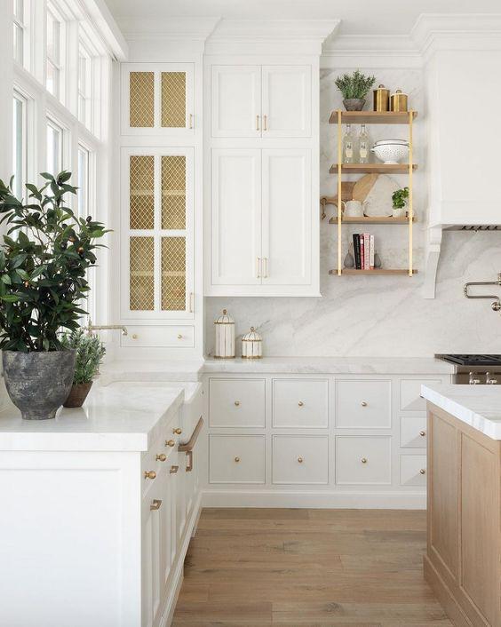 Love this beautiful timeless kitchen design with white cabinets and a white oak island