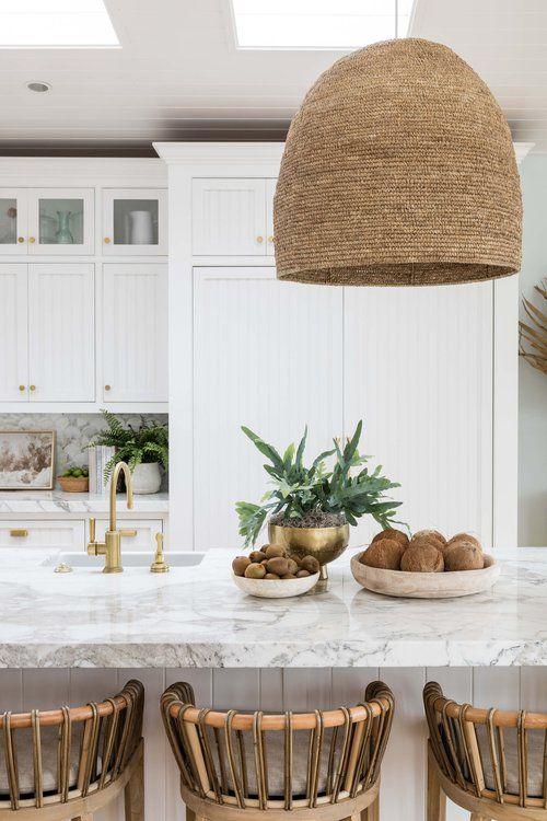 Love this beautiful modern coastal kitchen design with a woven pendant light, white cabinets and modern counter stools - kitchen lighting - kitchen cabinet ideas - pure salt interiors - katrina scott