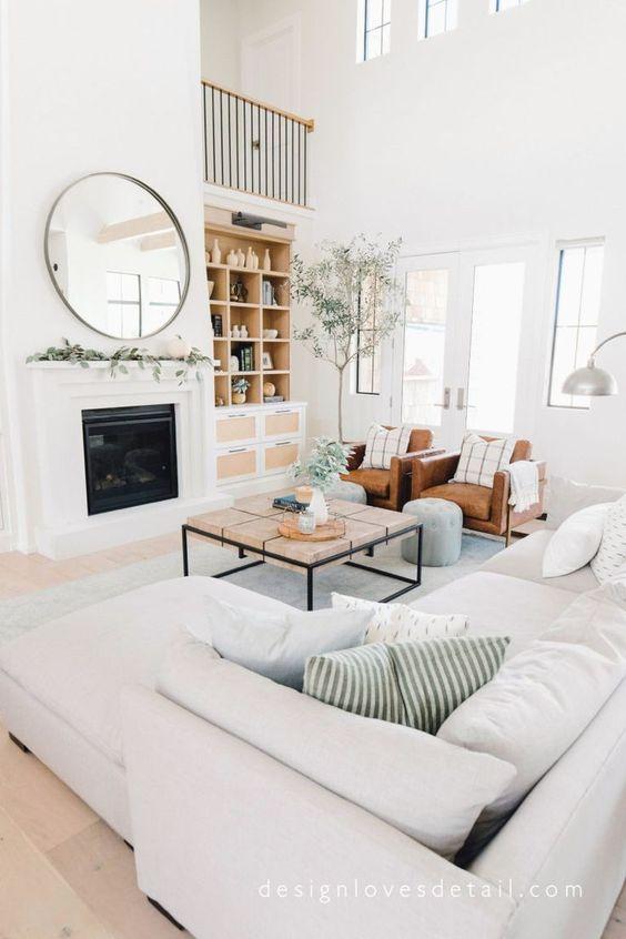 Love this beautiful modern living room design with a large sectional, fireplace, and neutral decor and furniture - living room ideas - living room furniture - coastal living rooms - design loves detail
