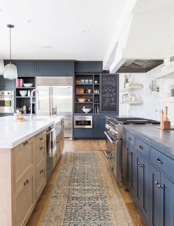 Love this beautiful kitchen design with gray blue cabinets, open shelving, and a light wood kitchen island - thea design - arch digest