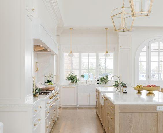 Love this beautiful kitchen design with a mix of white oak and white kitchen cabinets - cambridge home company - the cabinet gallery utah