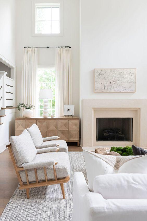 Love this beautiful living room and great room with white furniture, wood coffee table, and neutral decor - clare kenedy