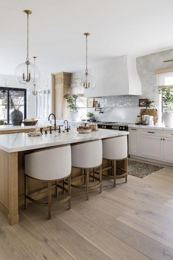 Love this beautiful modern organic kitchen design with a light wood island and a warm aesthetic - pure salt