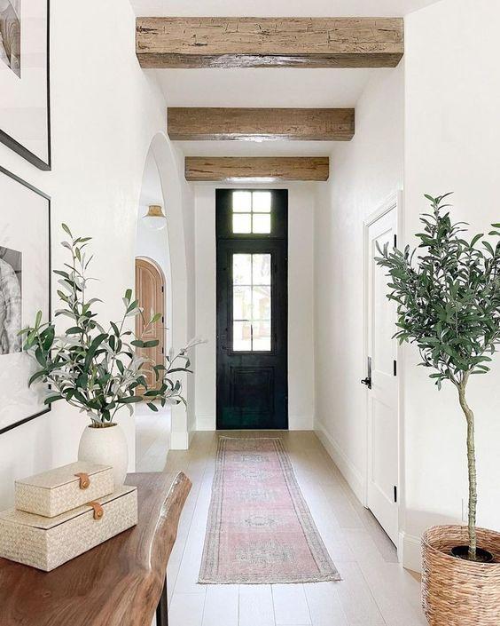 Love this beautiful entryway design with a warm aesthetic and chic neutral decor - west of main