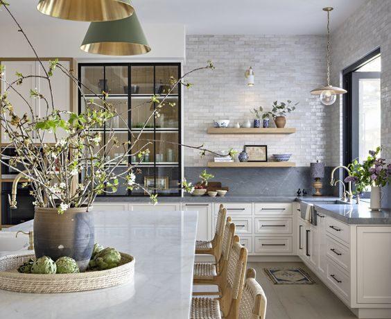 Love this beautiful kitchen design with woven counter stools, cone pendant lights, open shelving and natural and organic elements - intimate living interiors - Mediterranean style kitchen