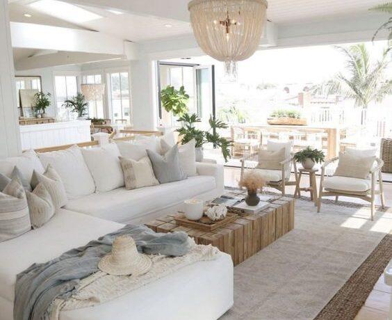 Love this beautiful modern living room design with wood coffee table, large white sectional, and neutral decor and furniture - beachy aesthetic - coastal living rooms - living room table - living room decor - coastal style - beach house - pure salt - katrina scott