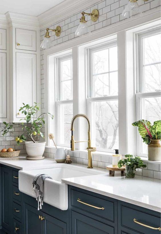 Love this beautiful kitchen design, with Cortland blue cabinets and white subway tile backsplash - meg mcsherry interiors