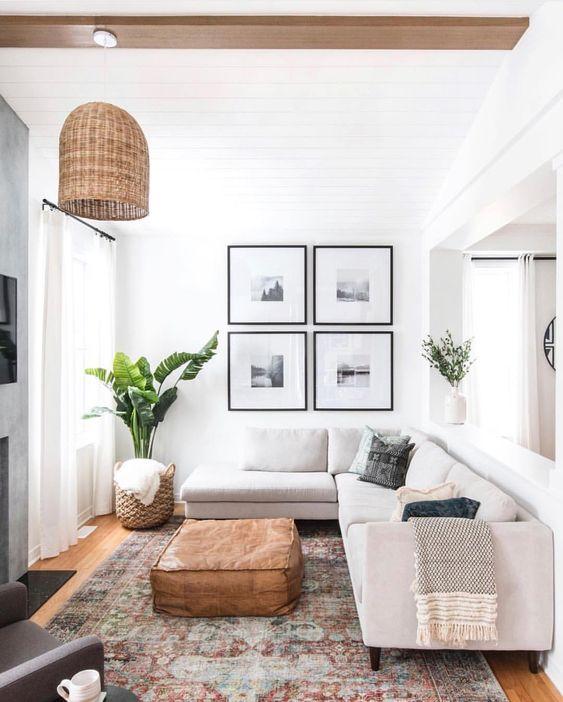 Love this light and airy modern living room design with large sectional and light wood coffee table - living room decor - living room furniture - long rectangle living room layout - living room inspo - coastal living rooms - coastal cowgirl - leclair decor