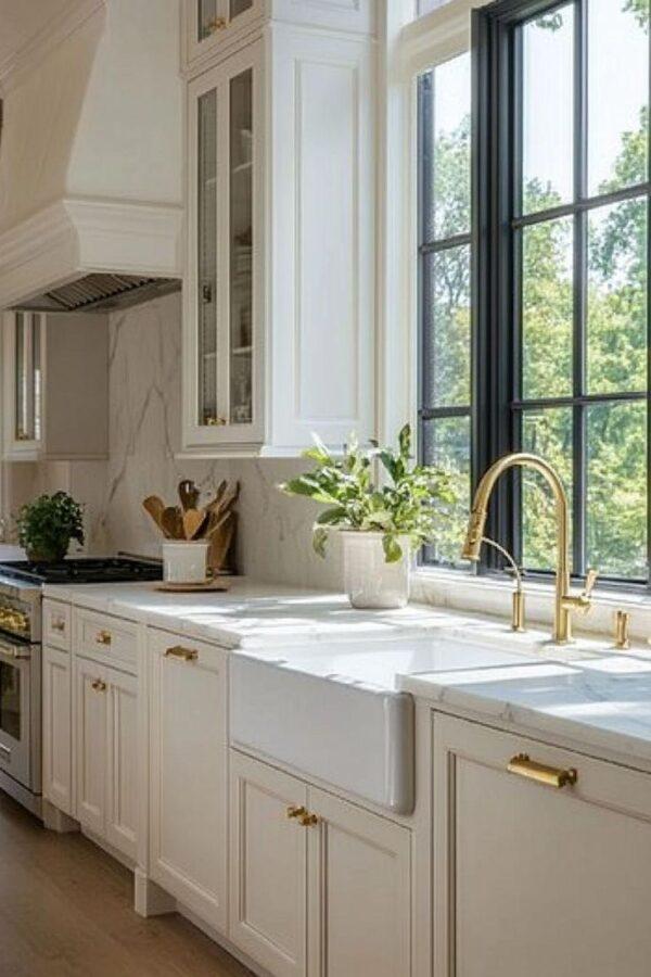 A timeless kitchen design with white cabinets and brass hardware - Jane at Home