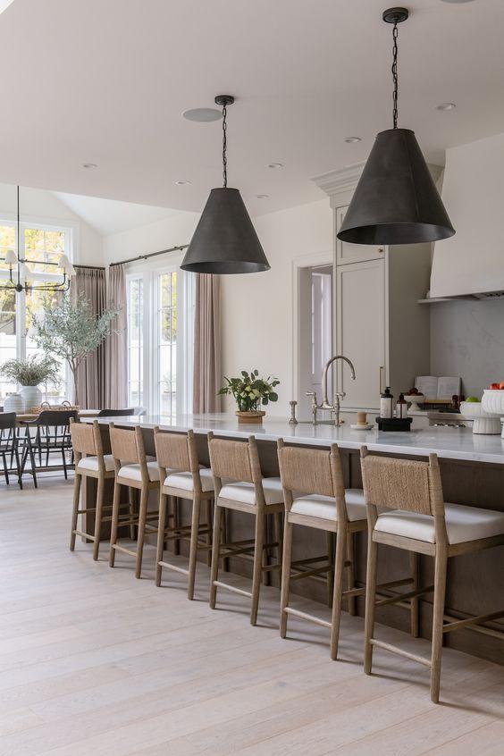 How to choose the best counter stools or bar stools for your kitchen, with ideas, images, height measurements, design styles, 2024 kitchen trends, organic modern spaces, white kitchen cabinets, and more!