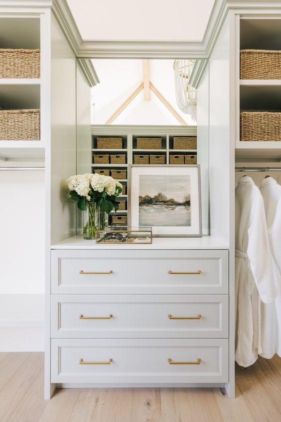 Love this beautiful walk in closet design with built-in shelves for organization - Cambridge Home Co master closet