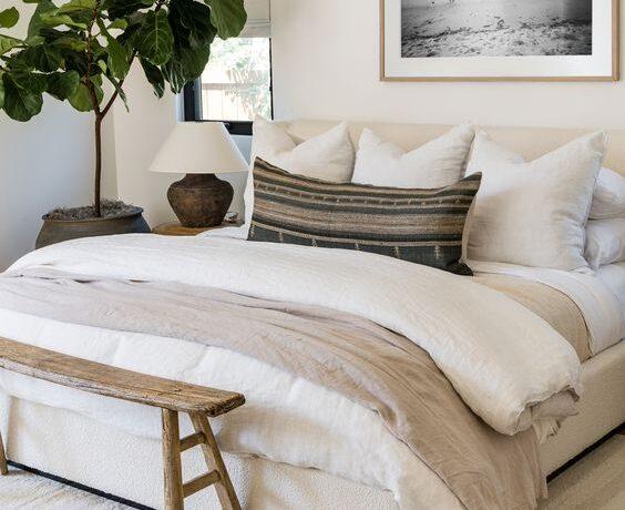 Love this beautiful modern master bedroom with cozy luxurious bedding and neutral decor - pure salt interiors