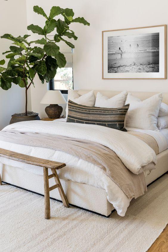 Love this beautiful modern master bedroom with cozy luxurious bedding and neutral decor - pure salt interiors