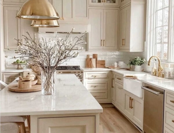 Love this warm neutral kitchen design with brass accents
