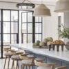 Love this beautiful kitchen design with woven pendants, wood counter stools and neutral decor - 2025 kitchen cabinet trends - Brandon architects - Patterson custom homes kitchen