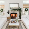 Modern Christmas decor in the living room with draped garland over mantel - identite collective