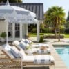 Love this beautiful outdoor living area with modern coastal furniture and decor