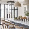 Love this beautiful kitchen design with woven pendants, wood counter stools and neutral decor - 2024 kitchen cabinet trends - brandon architects